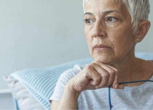 Older woman suffering from a chronic illness